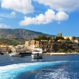 Castle rock and Marina Corta in Lipari seen from the sea, Aeolian Islands, Italy